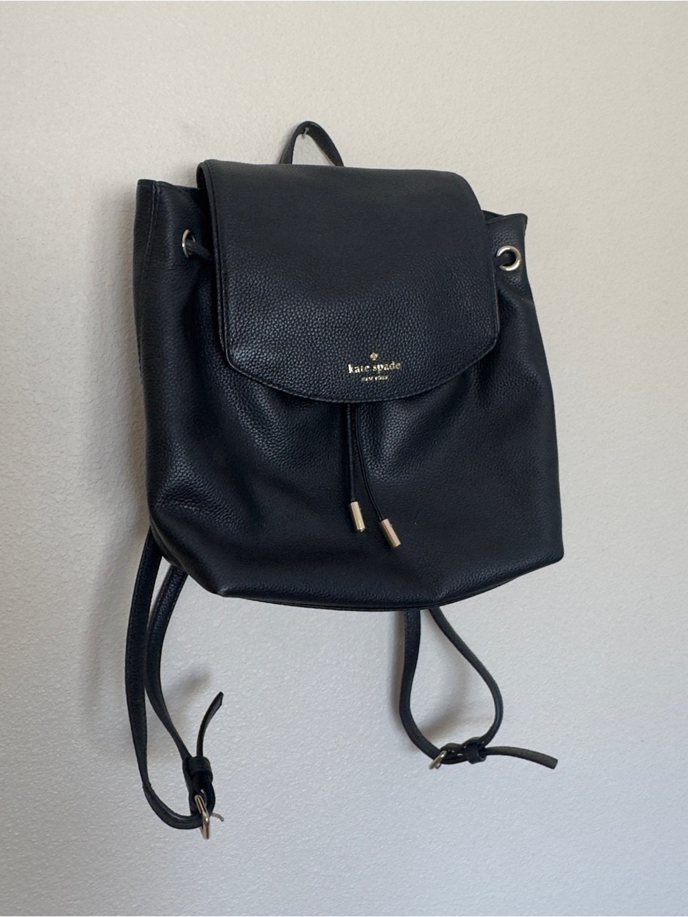 kate spade Black Pebble Leather Drawstring Backpack with Flap